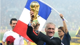 Didier Deschamps holds the World Cup trophy