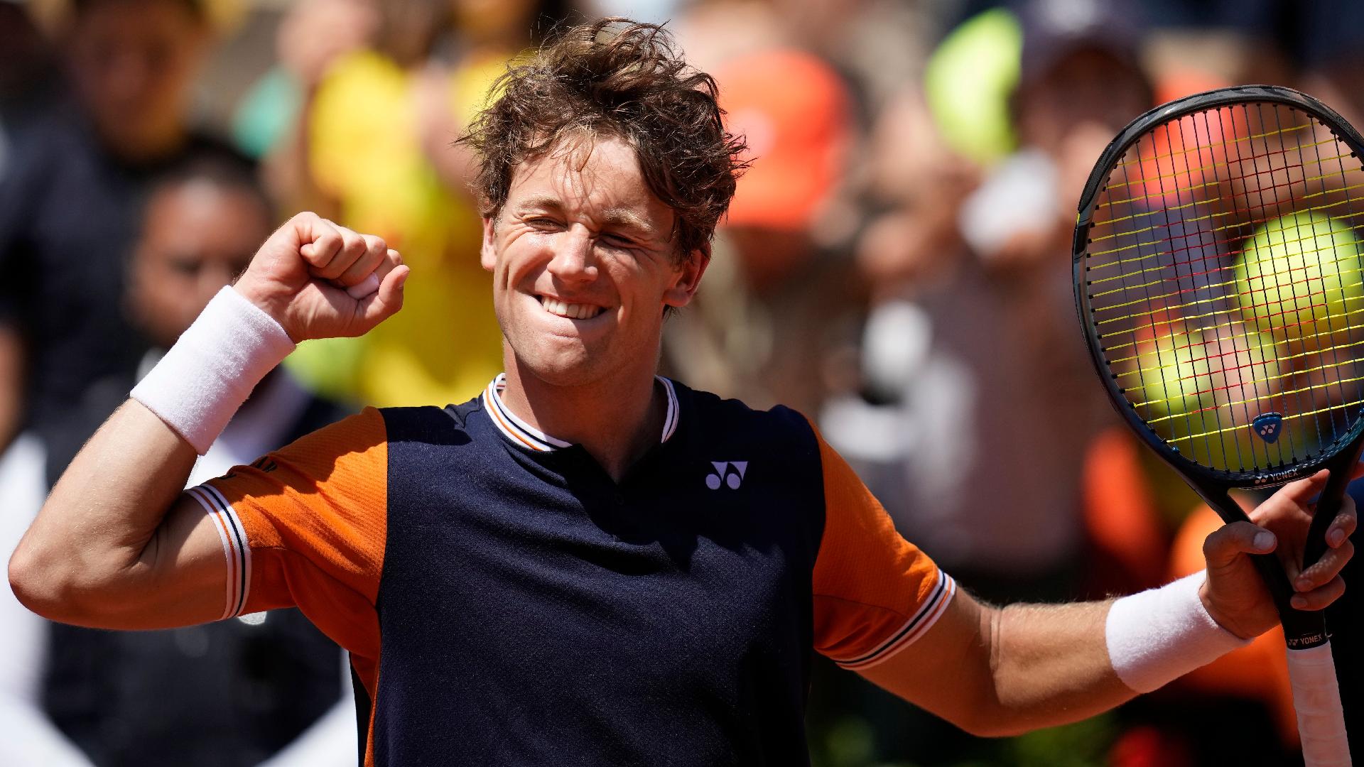 Casper Ruud celebrates reaching round four (Christophe Ena/AP)