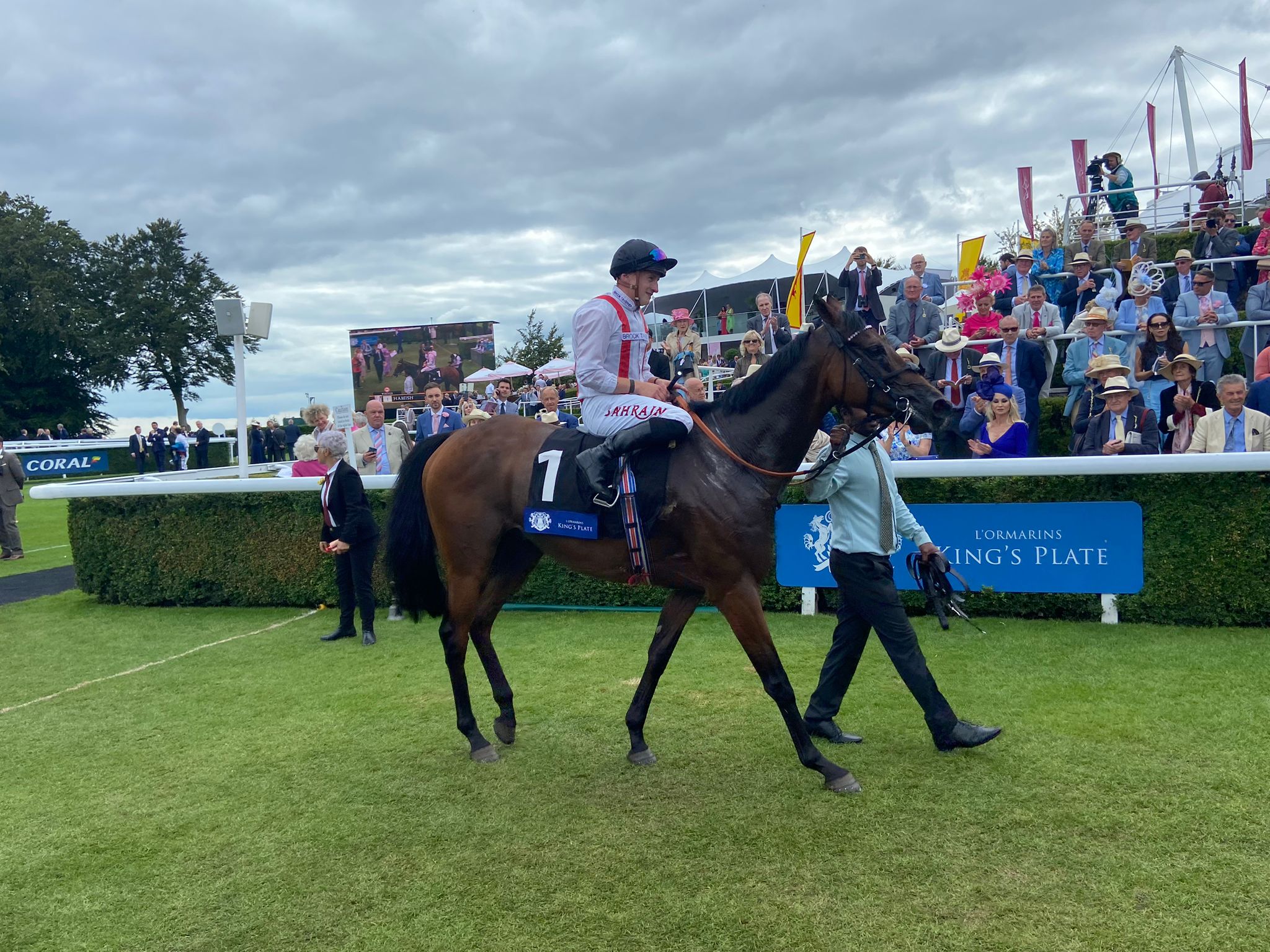 Hamish and Tom Marquand after winning at Goodwood