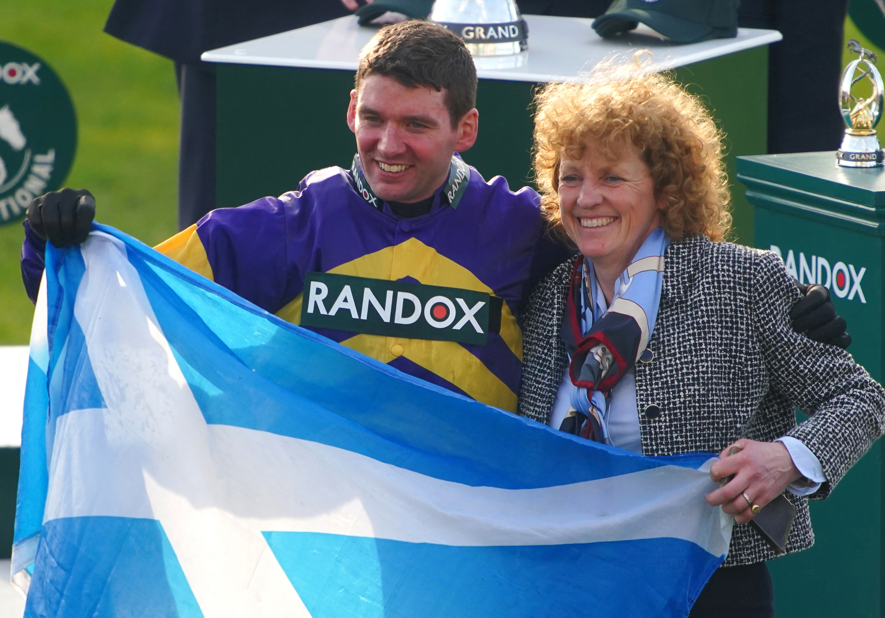 Derek Fox and Lucinda Russell celebrate after winning the Randox Grand National