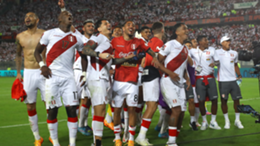 Luis Advíncula and Gianluca Lapadula of Peru celebrate with teammates after winning the FIFA World Cup Qatar 2022 qualification match between Peru and Paraguay
