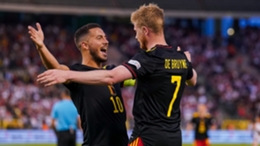 Kevin De Bruyne (right) thanks Eden Hazard for the assist in Belgium's 6-1 win against Poland