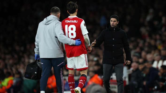 Takehiro Tomiyasu limped from the field in the first half against Sporting CP