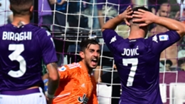 Mattia Perin reacts to saving Luka Jovic's penalty