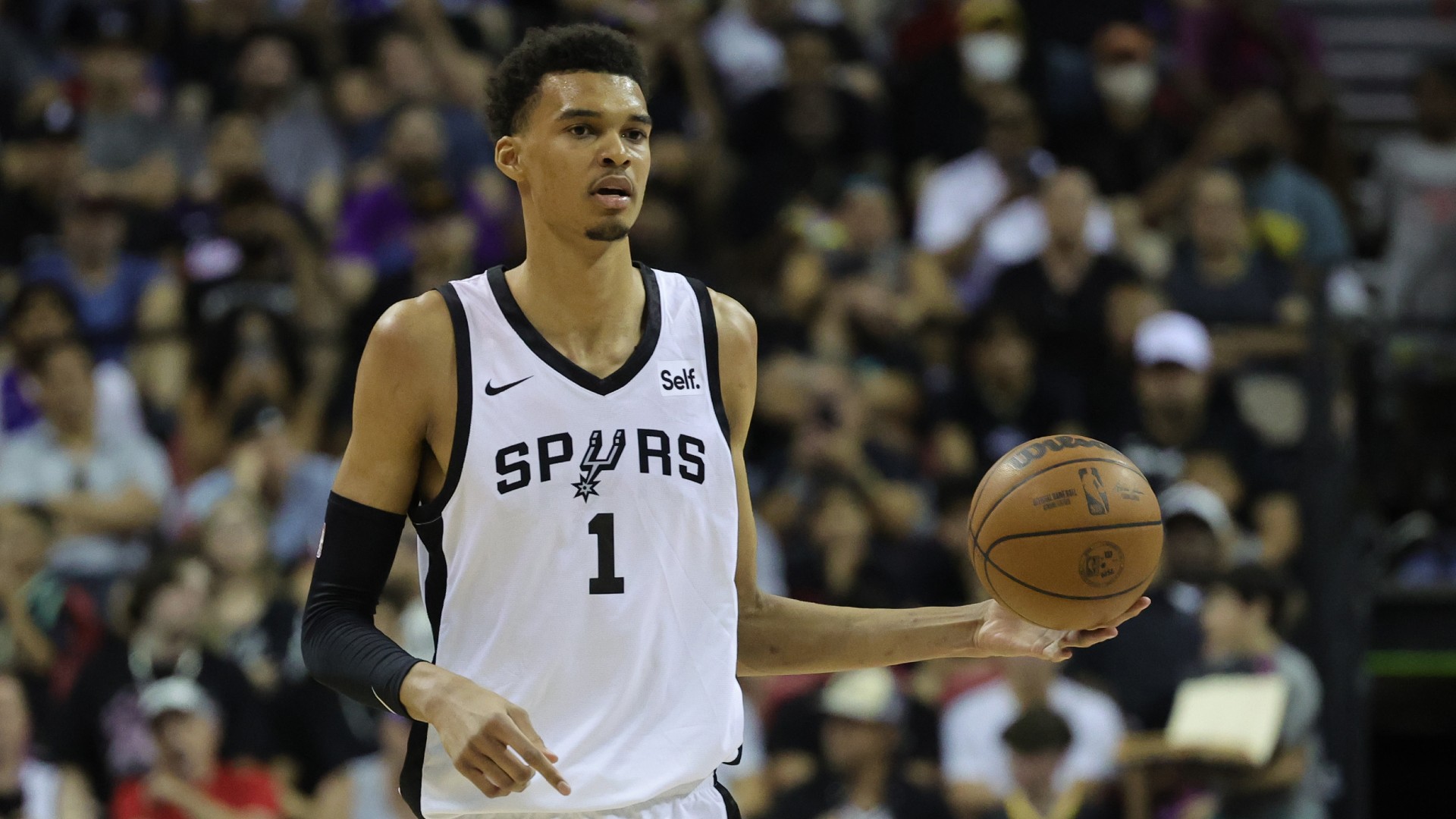 San Antonio Spurs forward Victor Wembanyama dribbles during his NBA Summer League debut