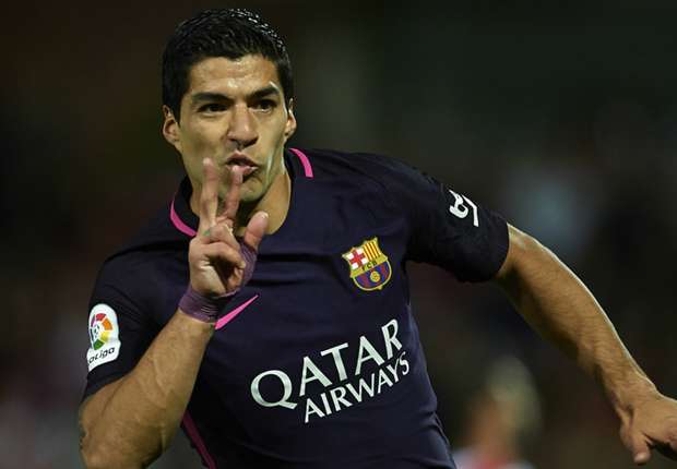 suarez-cropped_u8lmsoo0cew51lw0256ecn23z.jpg