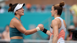 Bianca Andreescu shakes hands at the net after her three set victory against Maria Sakkari
