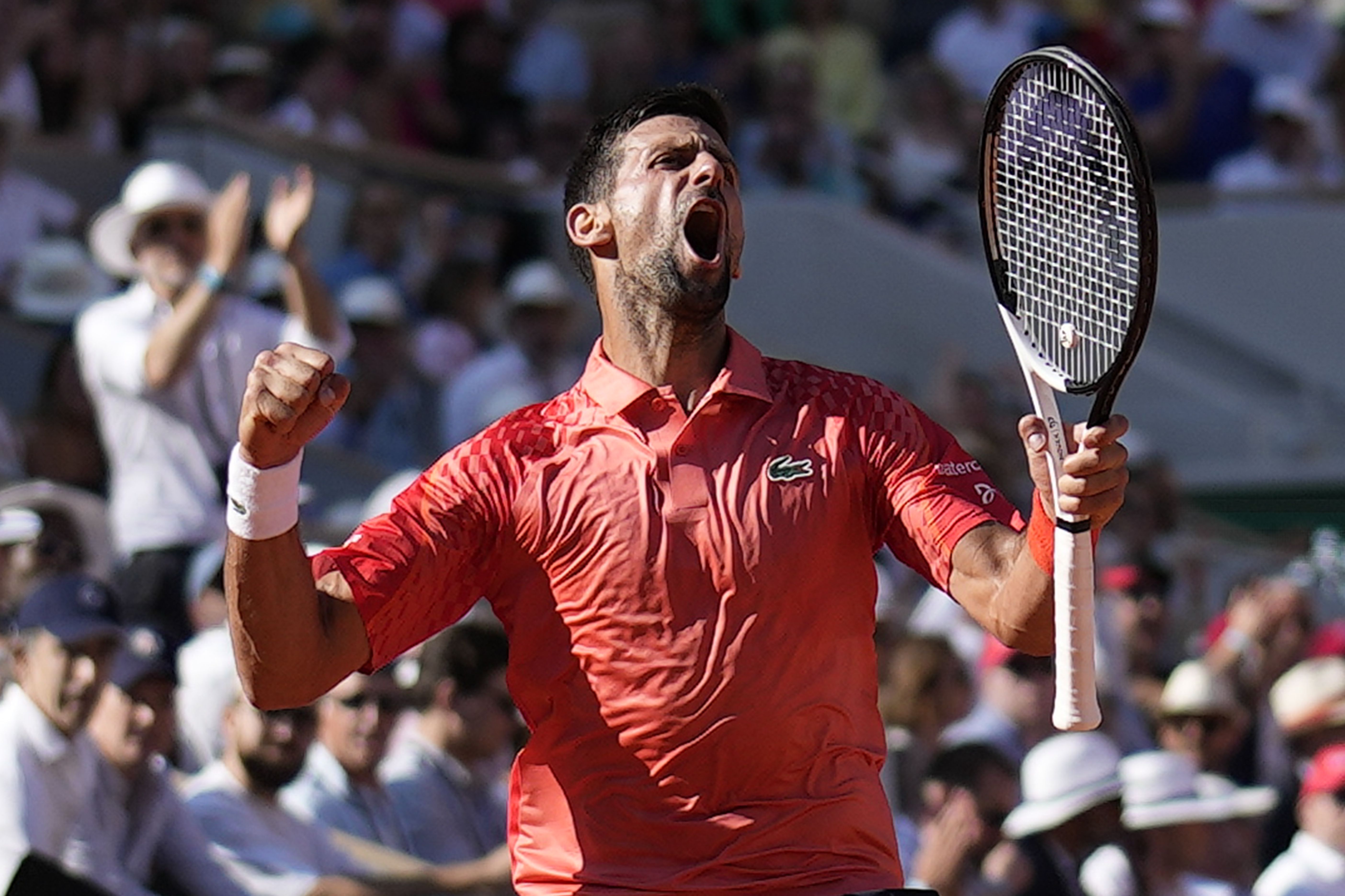 Novak Djokovic celebrates winning the second set against Alejandro Davidovich Fokina
