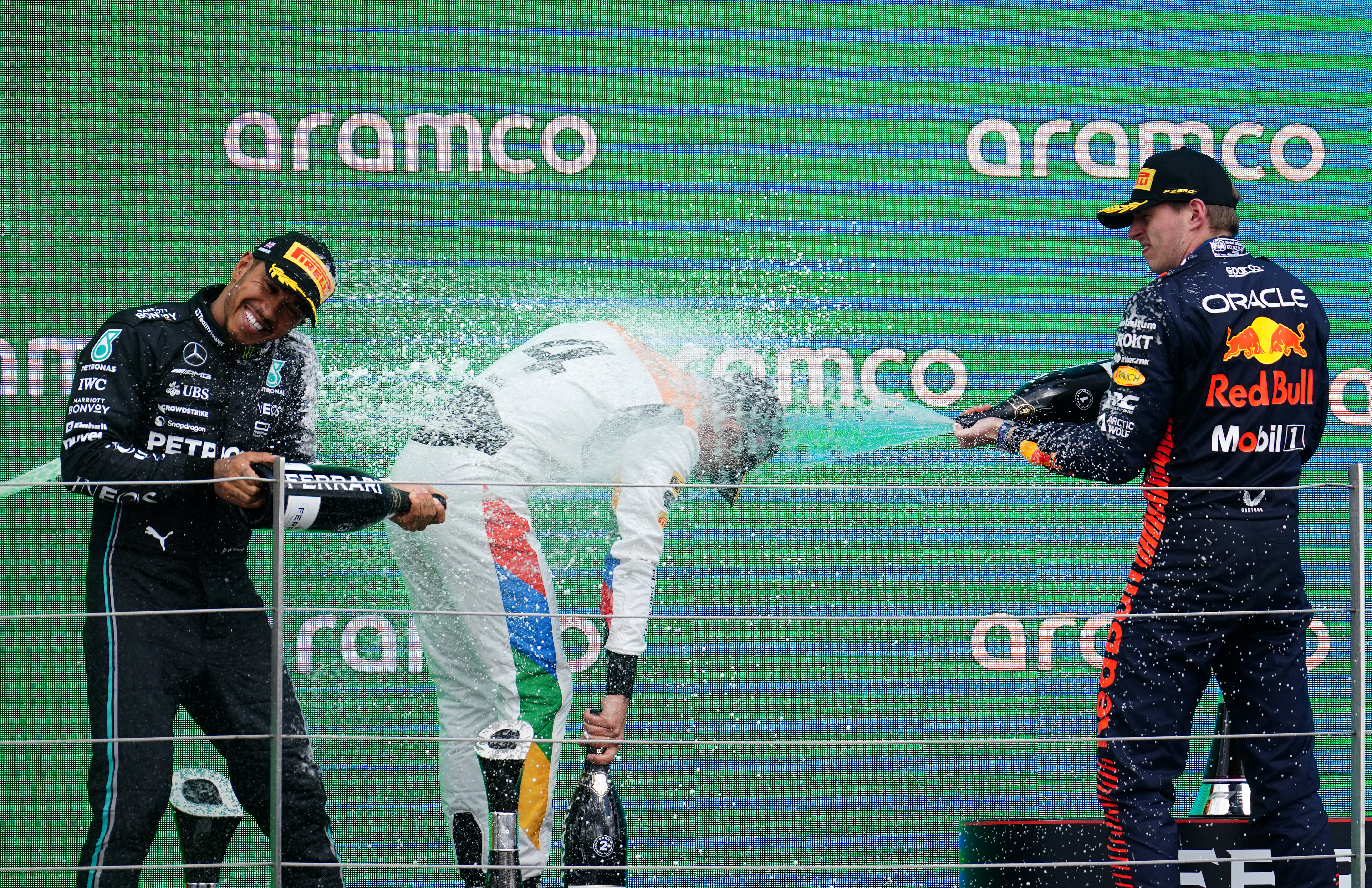Lewis Hamilton, Lando Norris and Max Verstappen (left to right) after the British Grand Prix (David Davies/PA)