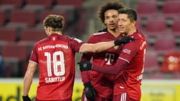 Robert Lewandowski (R) celebrates this third goal against Cologne
