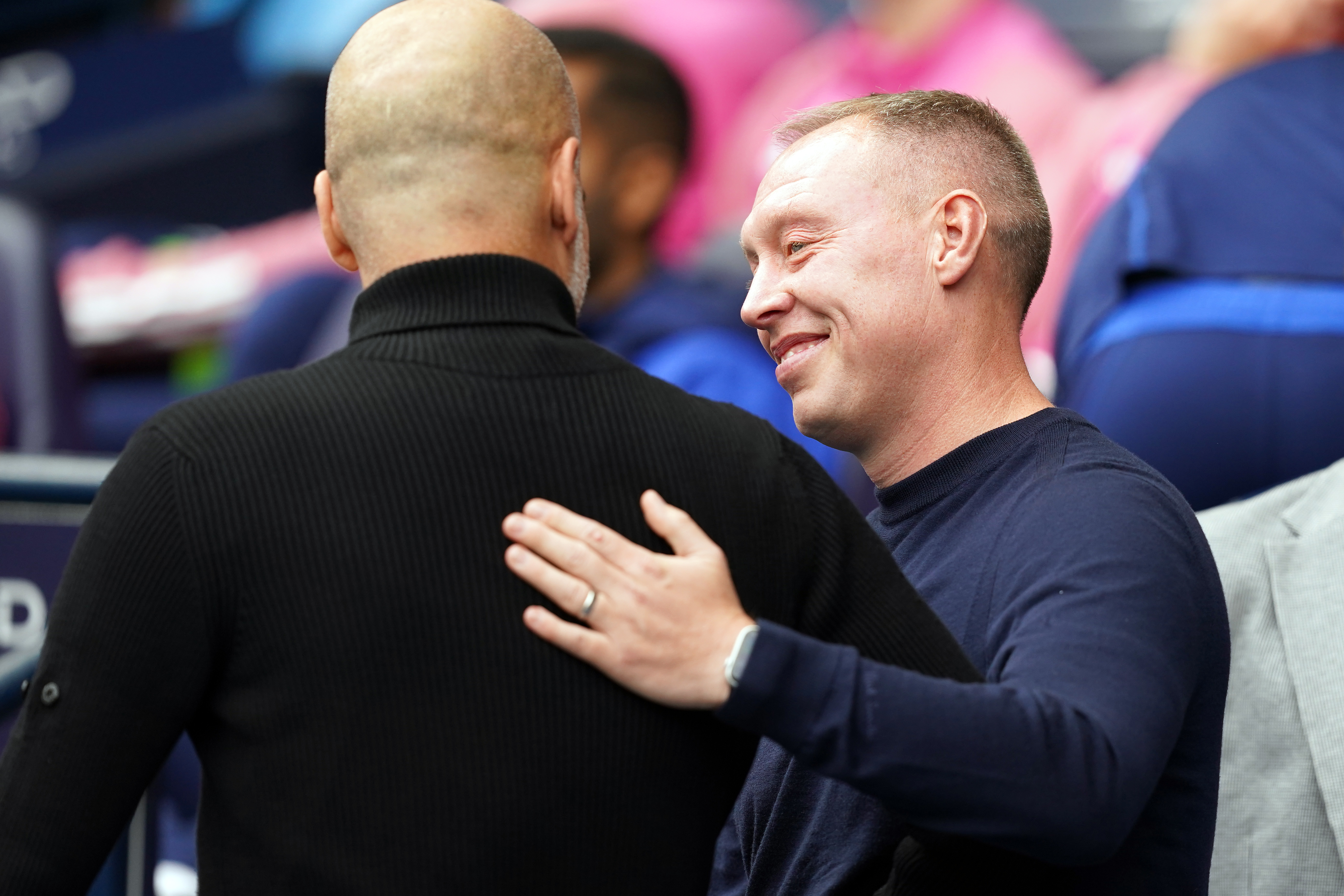 Steve Cooper, right, had mixed feelings after the defeat