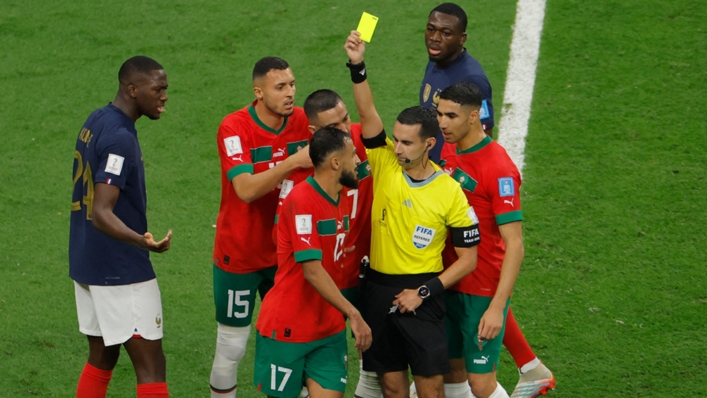 Cesar Ramos was surrounded by Morocco players after booking Sofiane Boufal