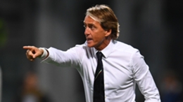 Italy boss Roberto Mancini gestures to his players from the sidelines