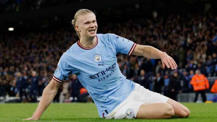 Erling Haaland celebrates his record-breaking goal