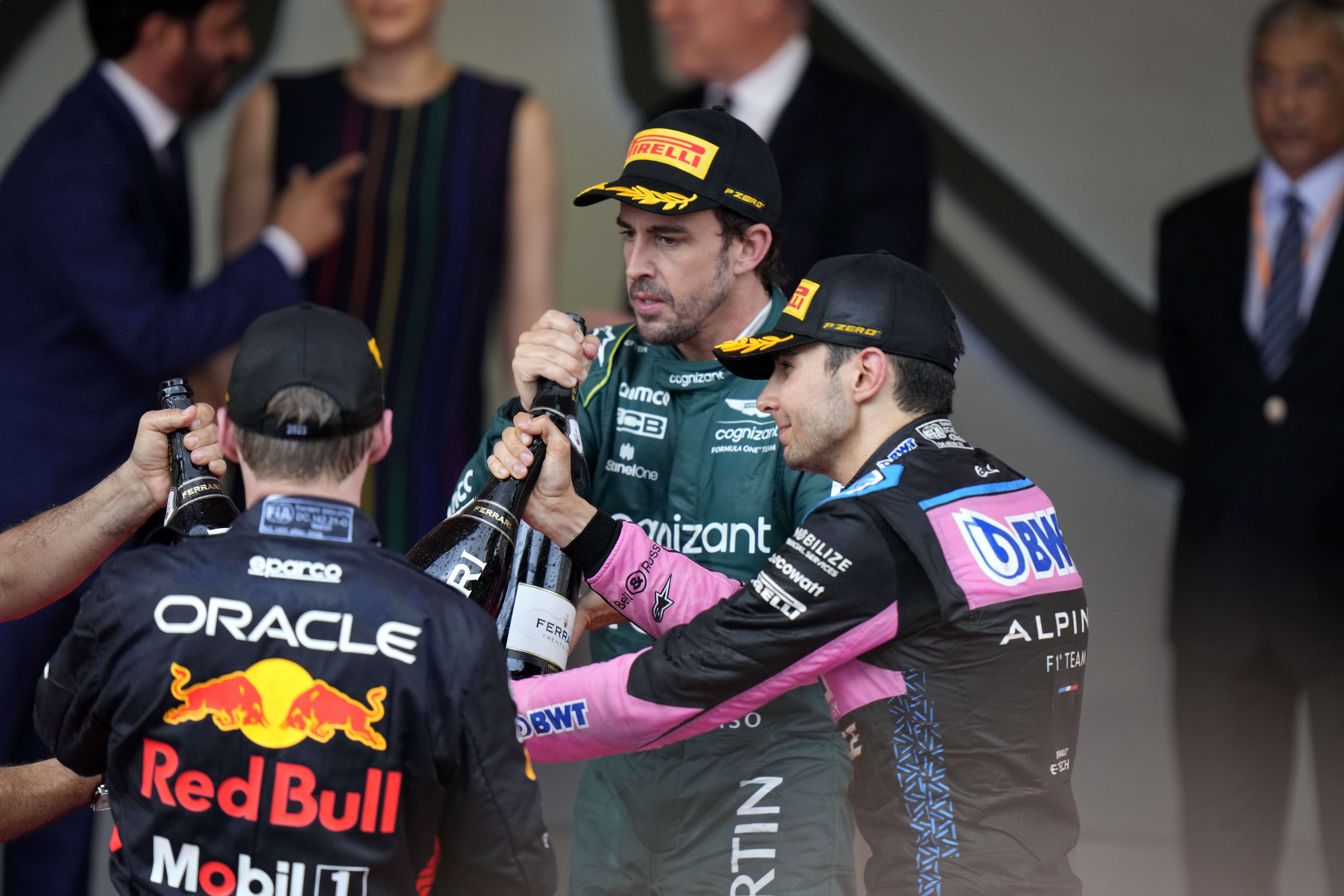 Monaco Grand Prix winner Max Verstappen, Fernando Alonso and Esteban Ocon celebrate