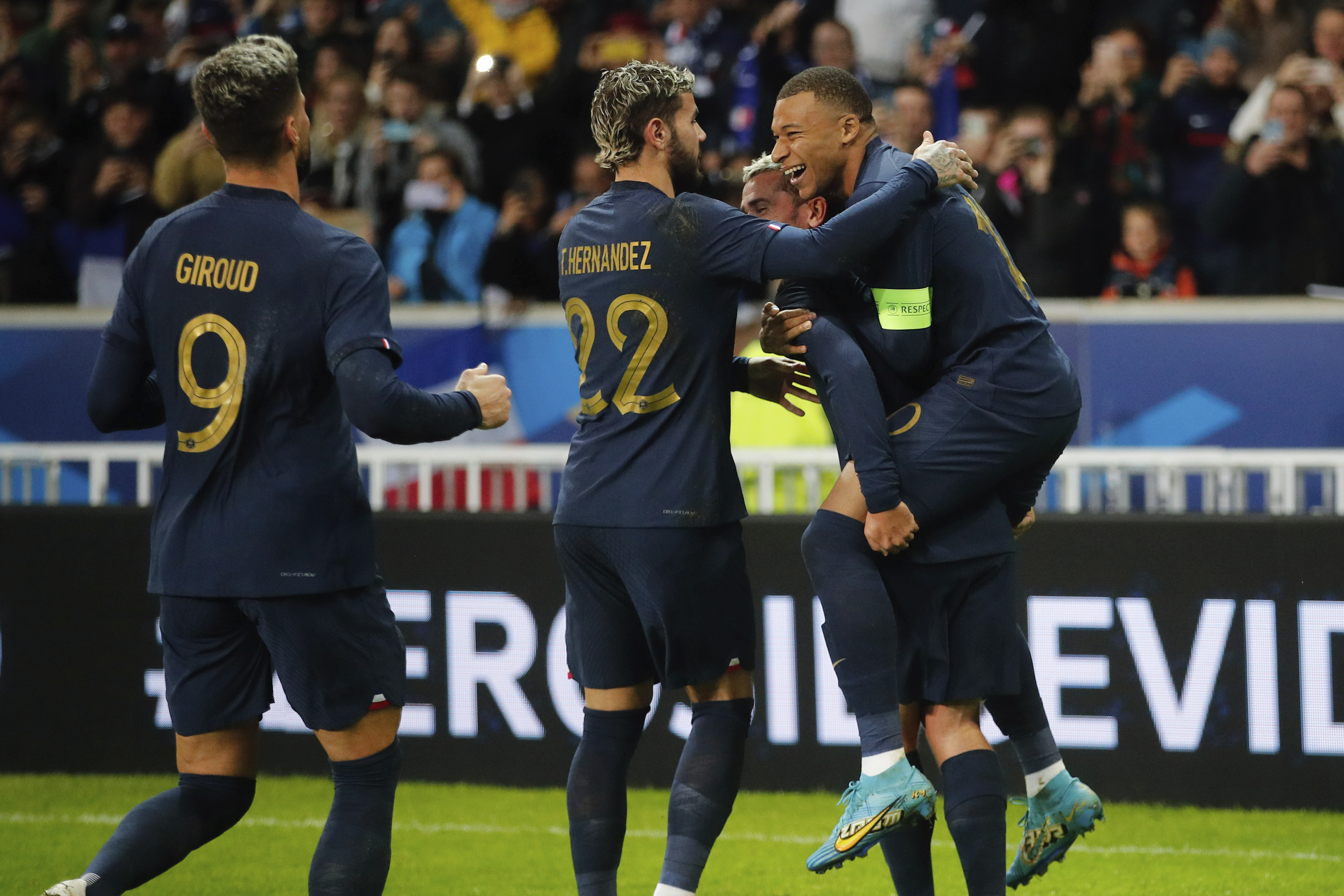 Kylian Mbappe, right, celebrates his goal