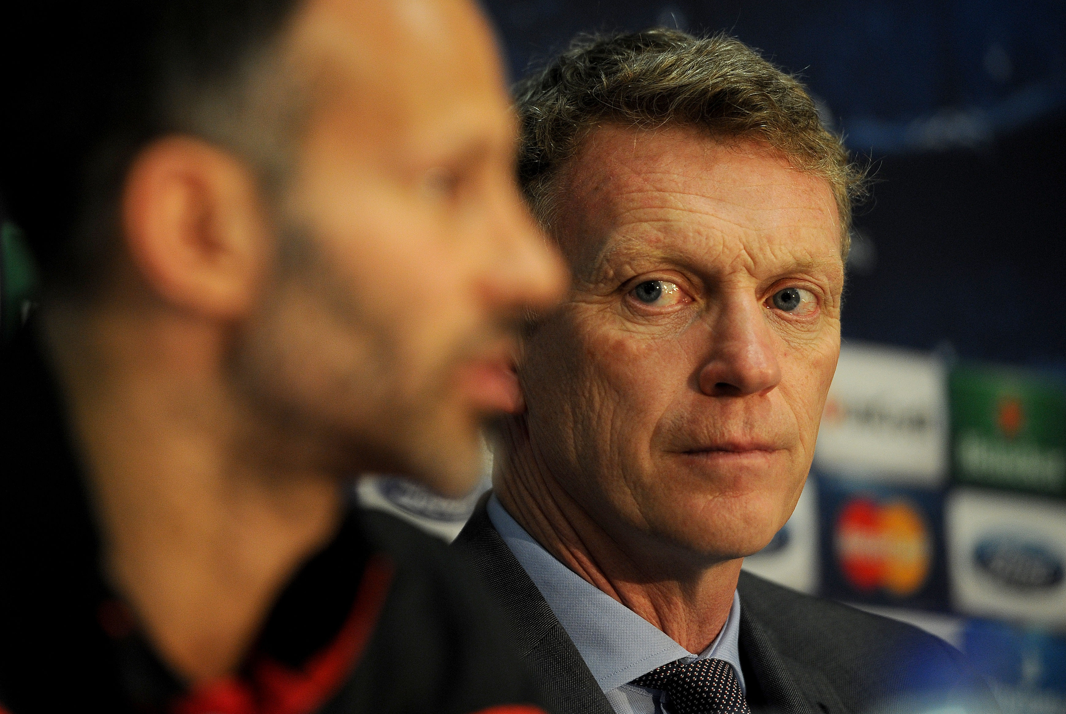David Moyes, right, looks on as Ryan Giggs speaks at a Champions League press conference