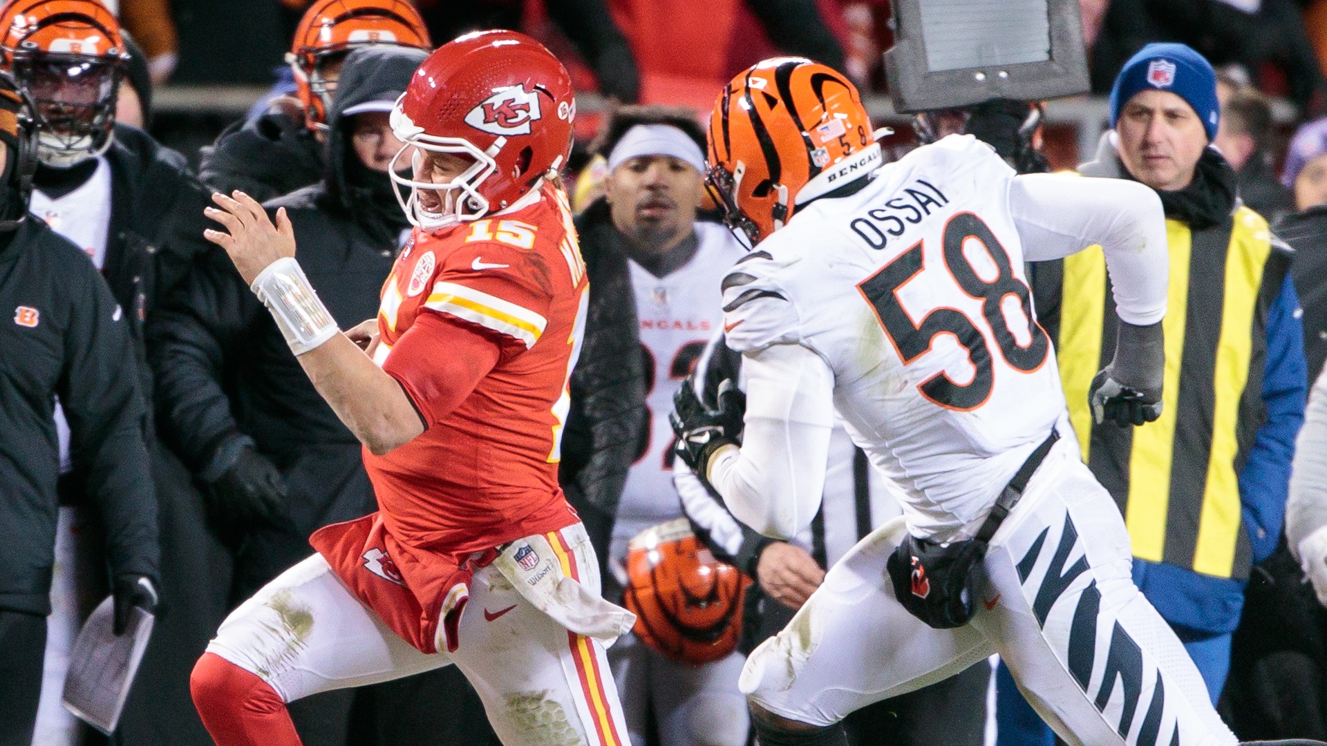 Joseph Ossai pursues Patrick Mahomes out of bounds