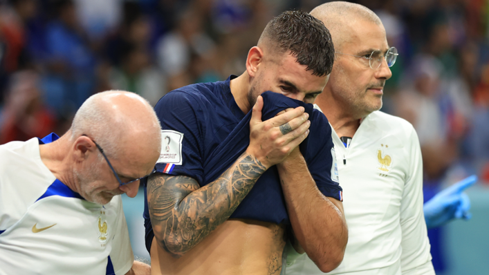Lucas Hernandez of France reacts after an injury during the World Cup