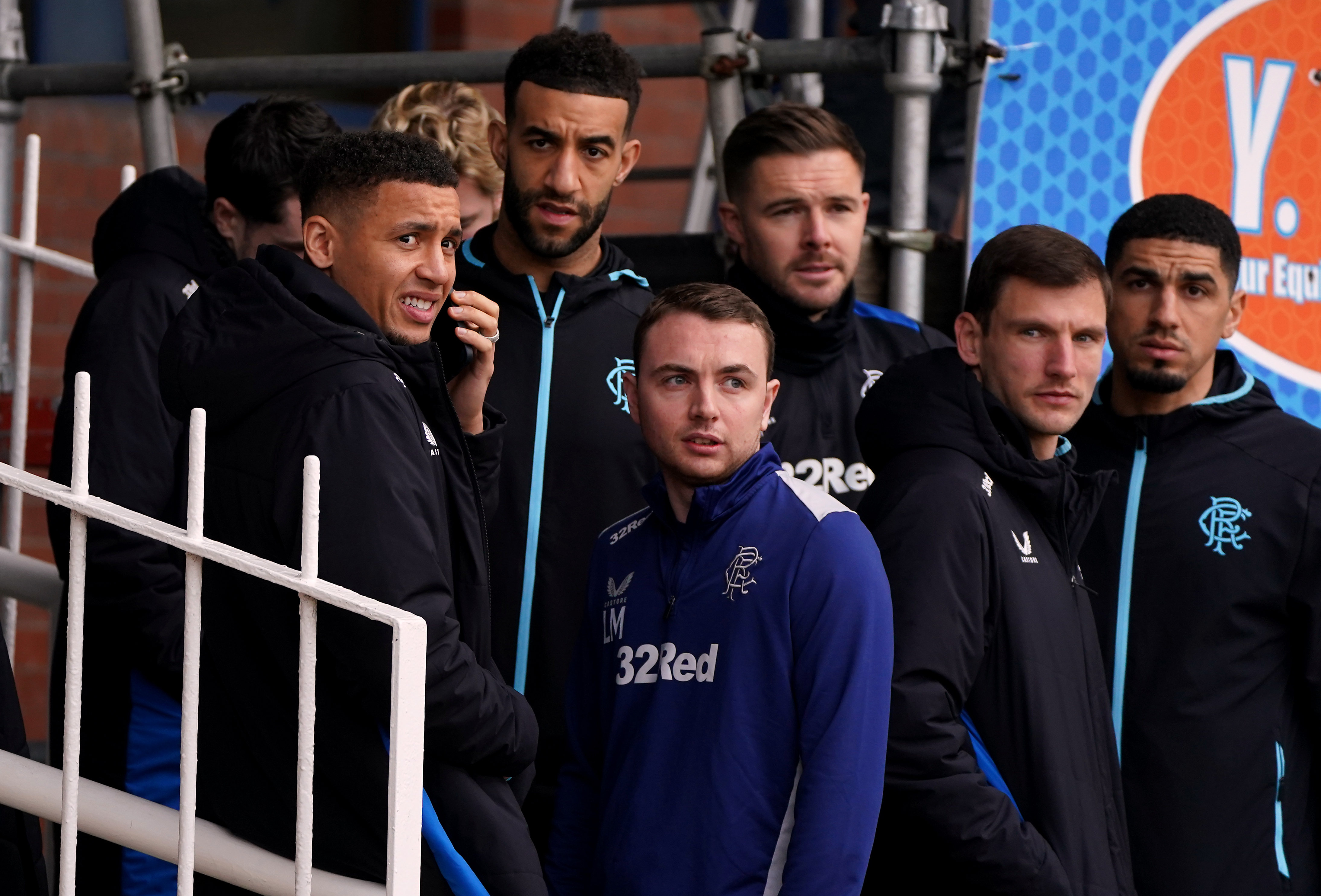 Rangers team-mates await news on from the pitch inspection