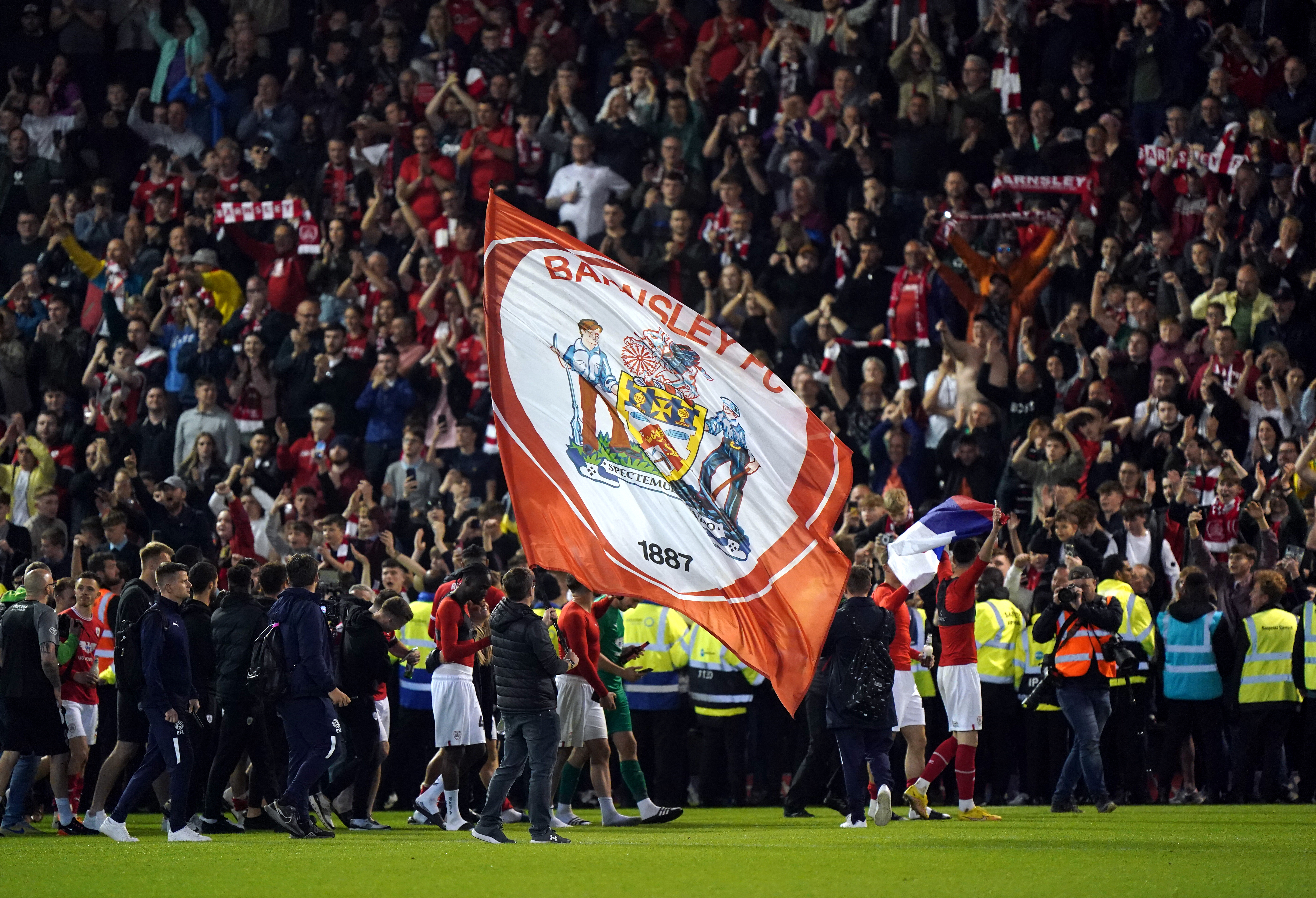 Barnsley's players celebrate their play-off semi-final win against Bolton at Oakwell