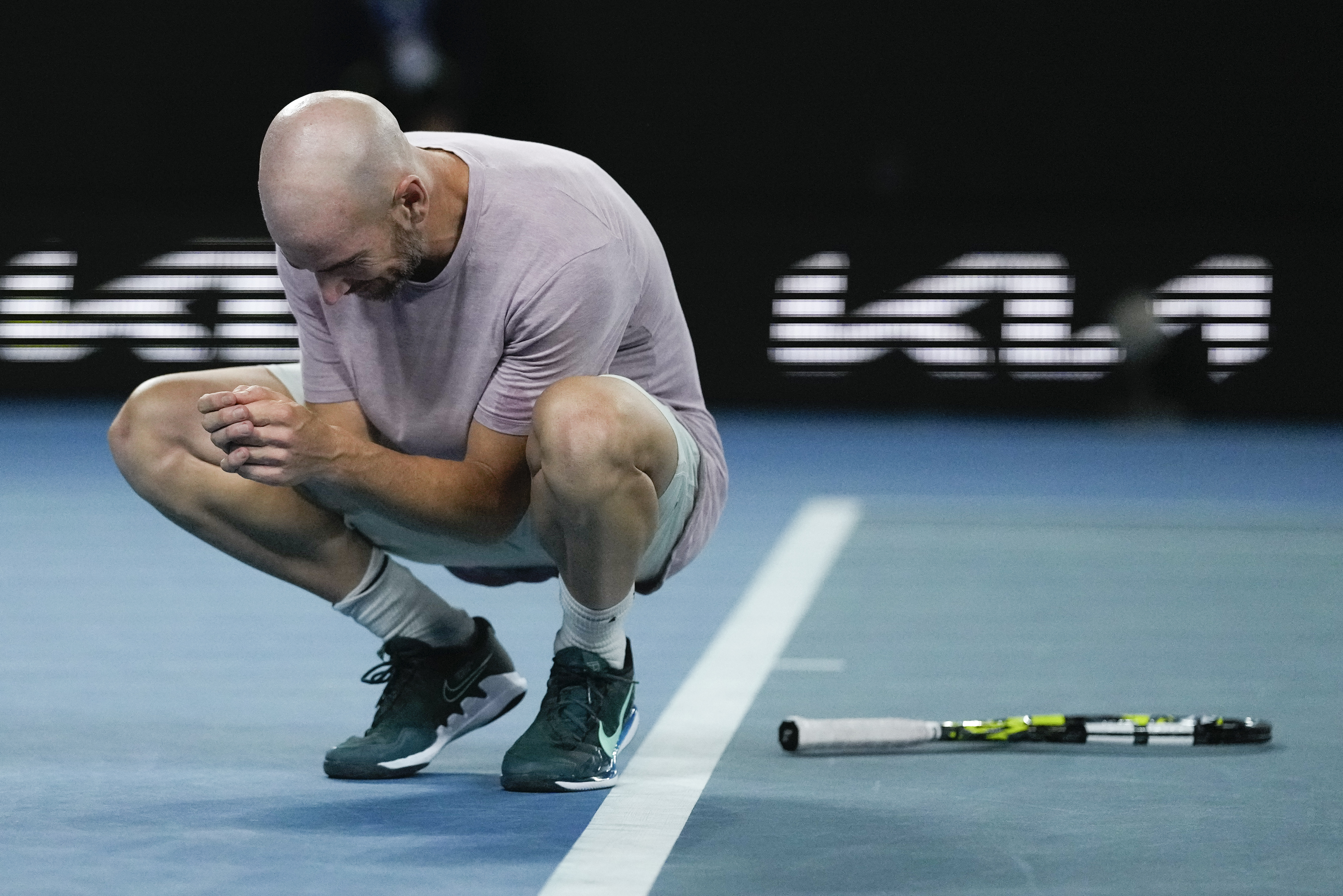 Adrian Mannarino reacts after beating Ben Shelton to set up a clash with Novak Djokovic