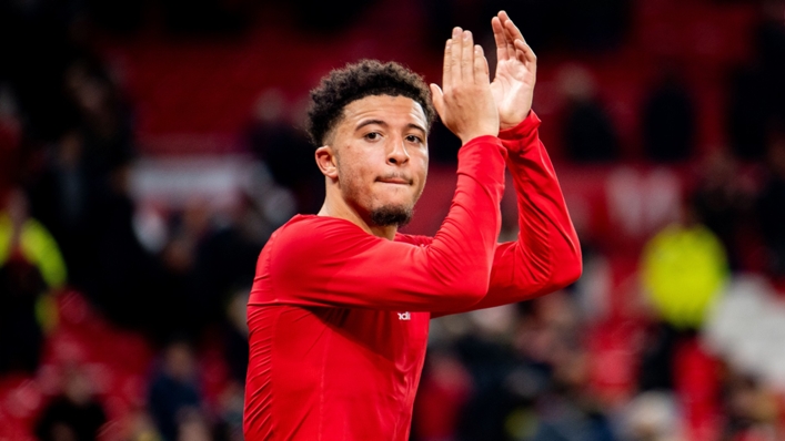 Jadon Sancho applauds Manchester United's supporters after the draw with Leeds United