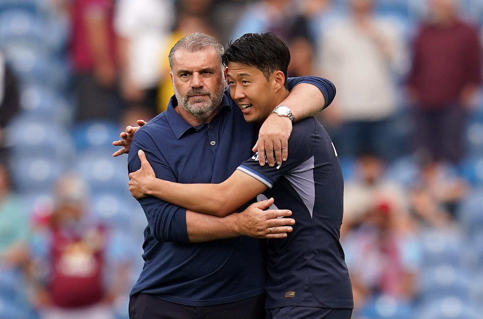 Ange Postecoglou, left, embraces Son Heung-min after the final whistle