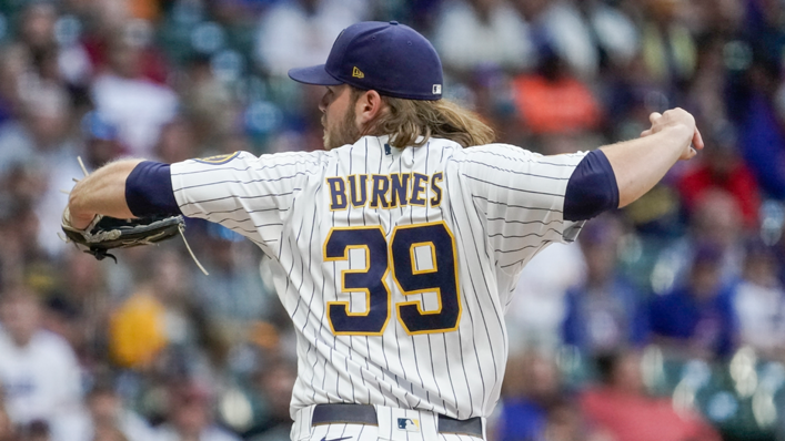 Milwaukee Brewers starting pitcher Corbin Burnes throws during the first inning of a baseball game against the Chicago Cubs