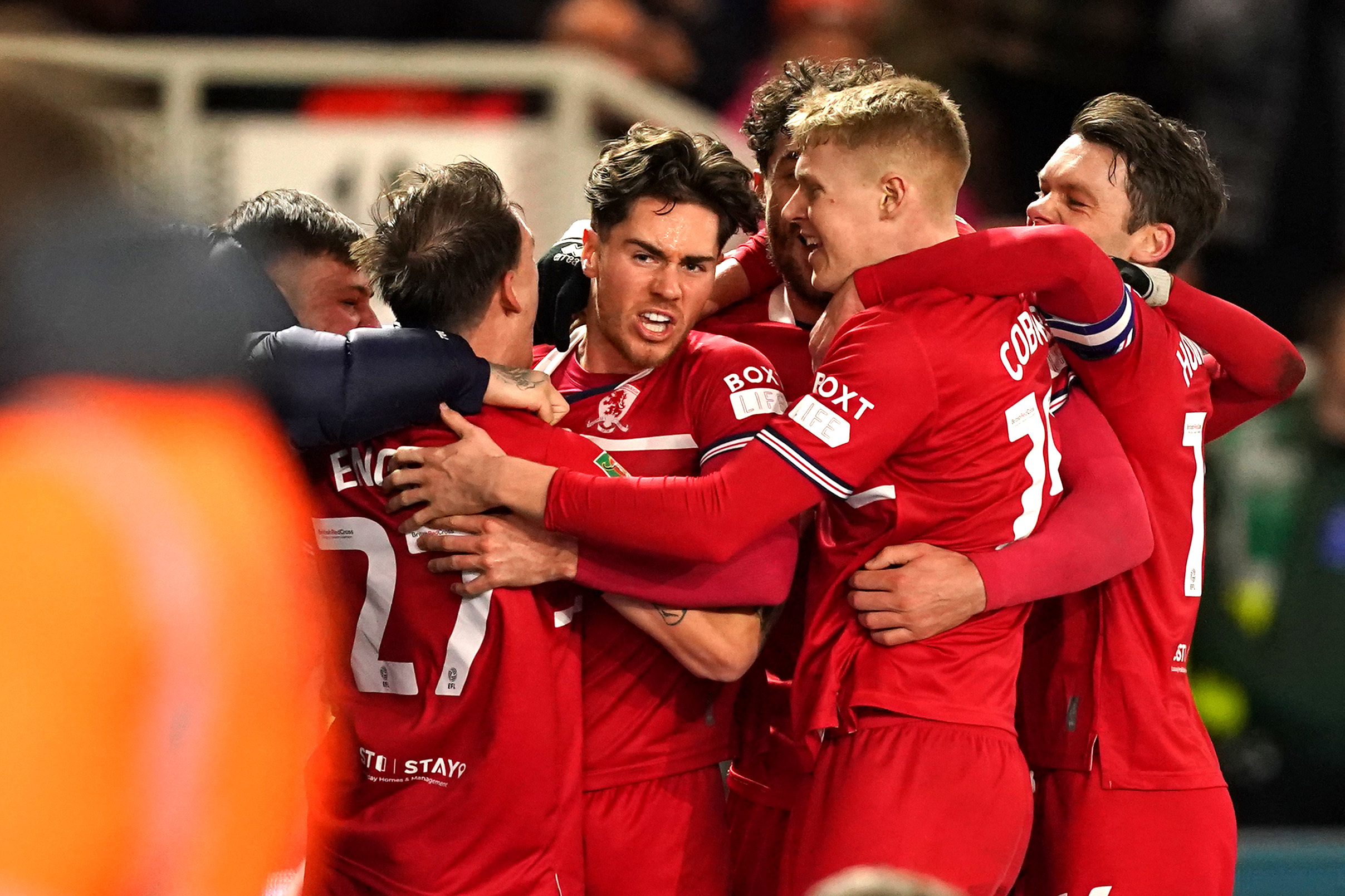 Hayden Hackney, centre, celebrates with team-mates after scoring Middlesbrough’s goal
