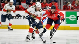 Carter Verhaeghe skates forward with the puck in the Florida Panthers' win against the Washington Capitals
