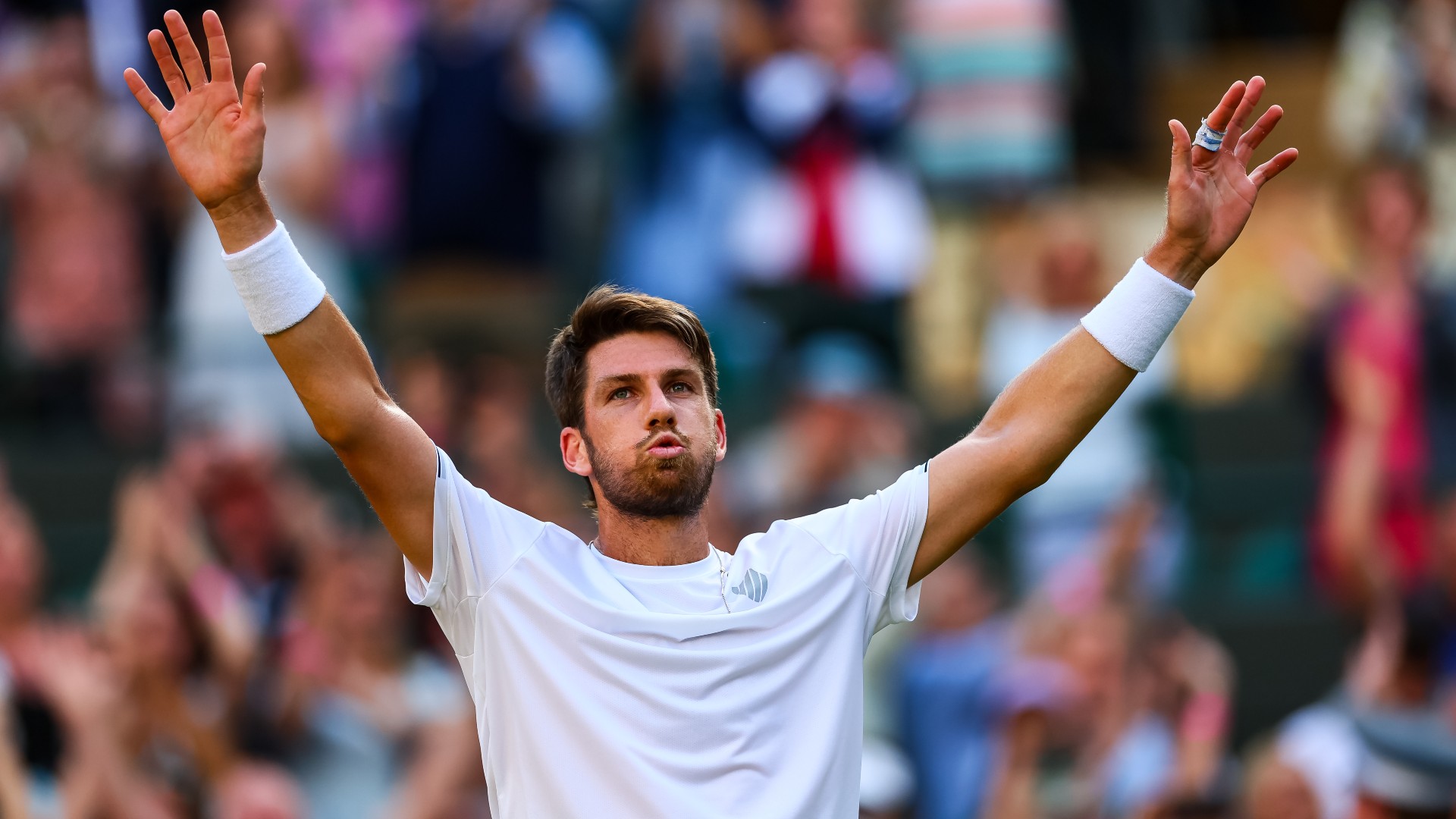 Cameron Norrie celebrates his win over David Goffin