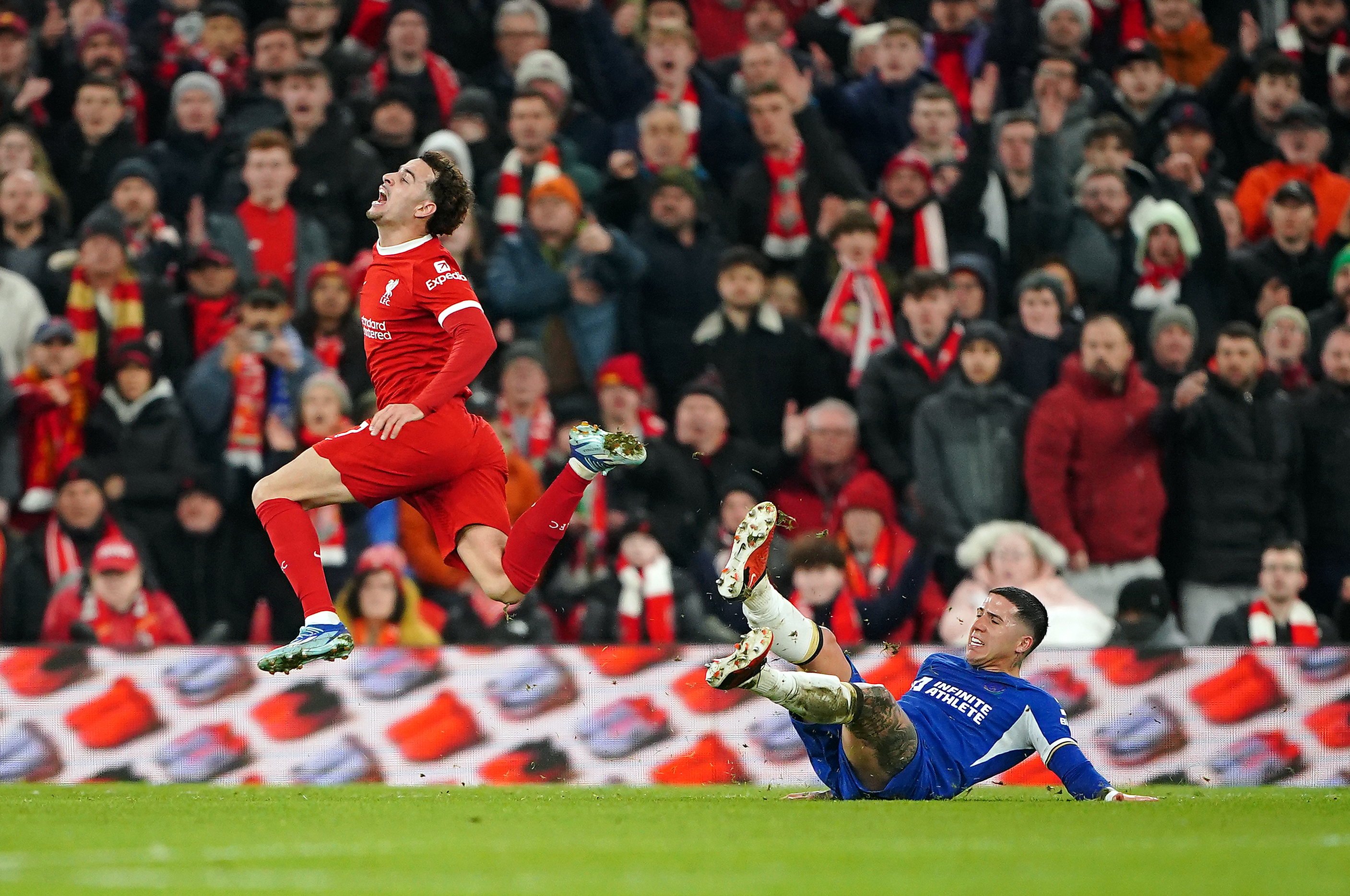 Chelsea’s Enzo Fernandez fouls Liverpool’s Curtis Jones