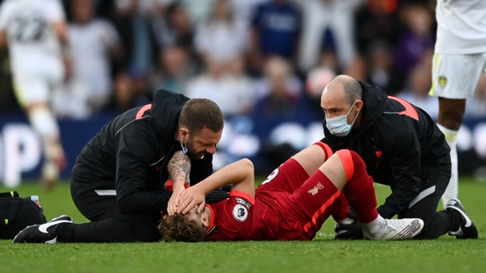 Liverpool's Harvey Elliott is treated after his injury