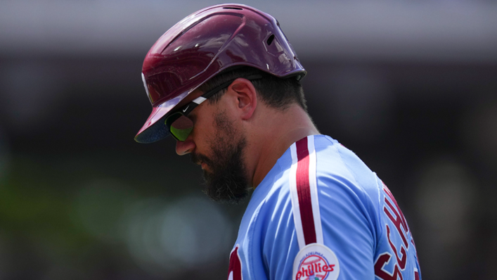 Kyle Schwarber of the Philadelphia Phillies walks off the field after an injury in the bottom of the fifth inning against the Miami Marlins