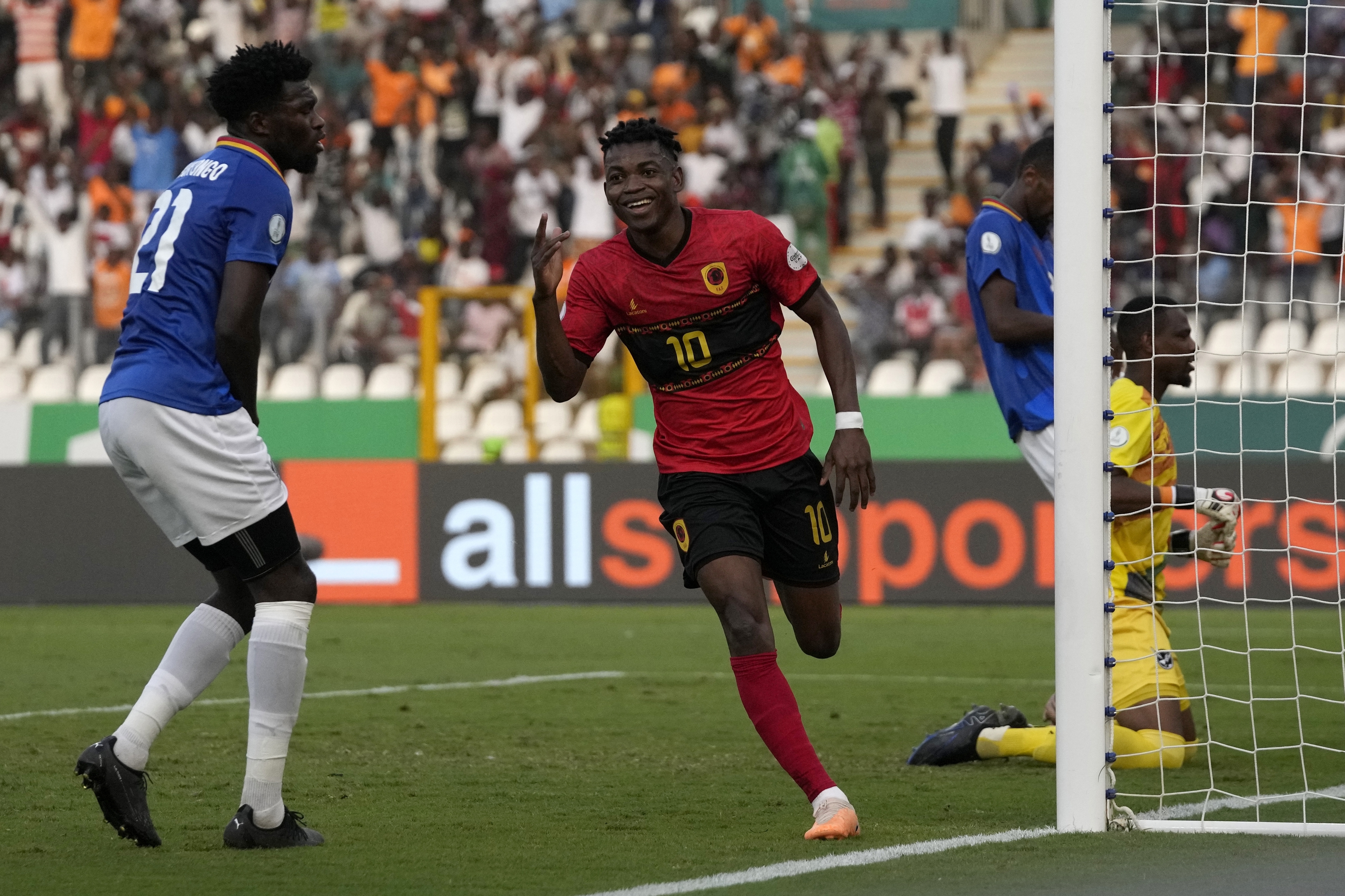 Angola’s Gelson Dala celebrates after scoring