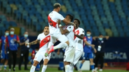 Peru players celebrate beating Paraguay on penalties