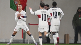 Cristiano Ronaldo (L) celebrates scoring for Portugal against Luxembourg