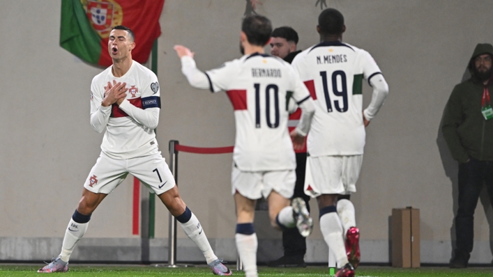 Cristiano Ronaldo (L) celebrates scoring for Portugal against Luxembourg