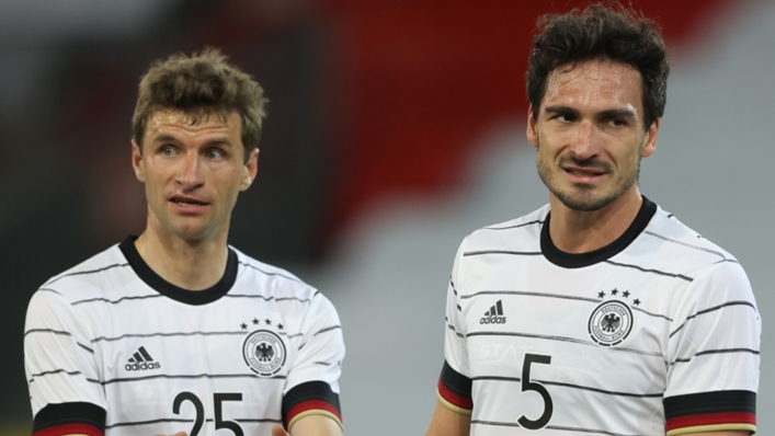 Germany duo Thomas Muller and Mats Hummels in action against Denmark