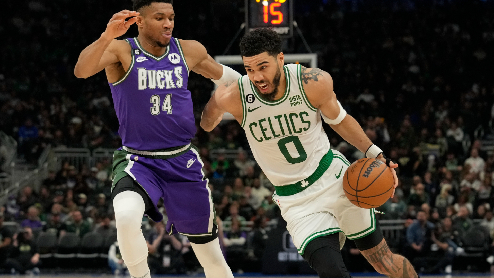 Jayson Tatum drives past Giannis Antetokounmpo for two of his game-high 40 points