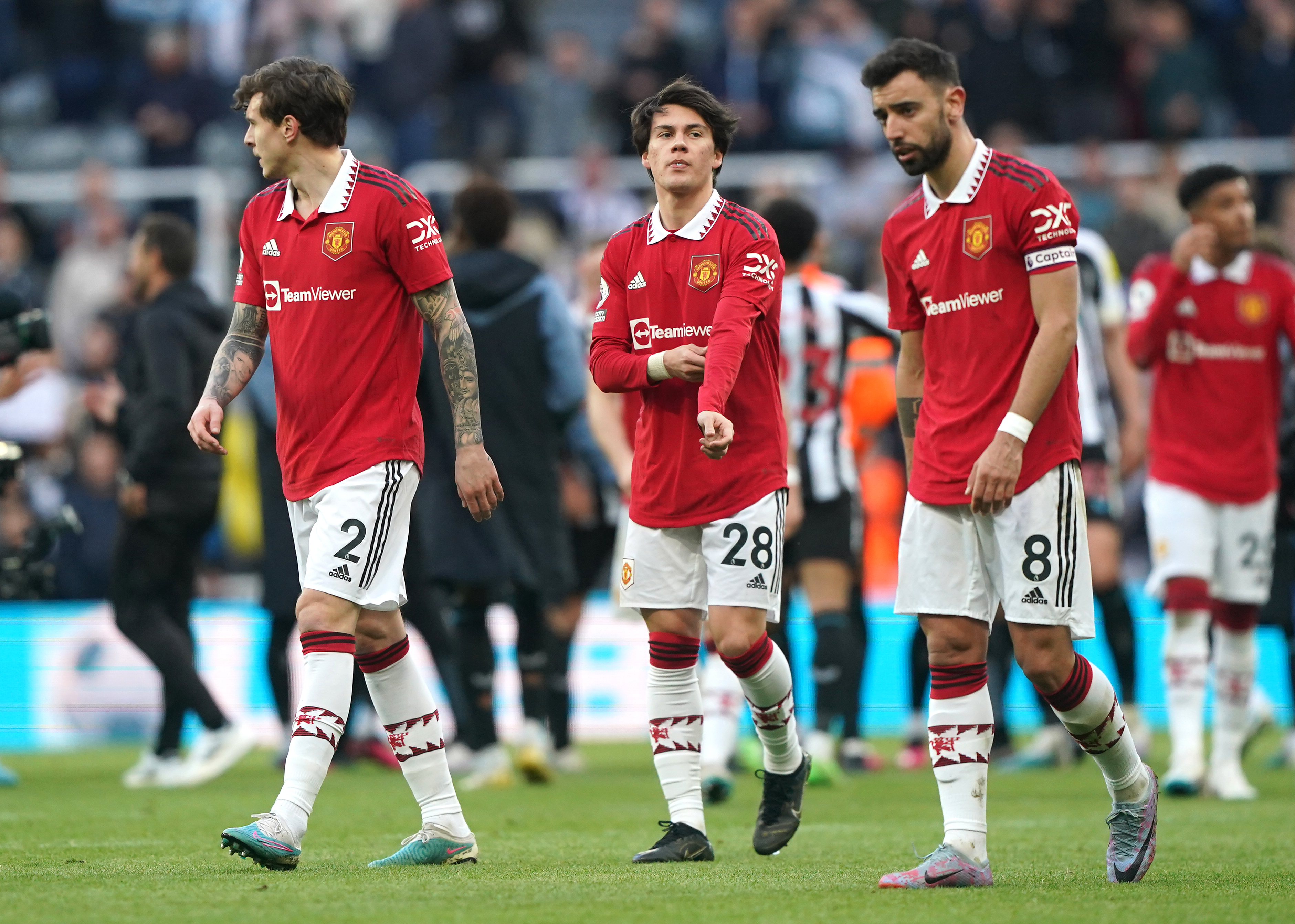 Manchester United’s Victor Lindelof, Facundo Pellistri and Bruno Fernandes look dejected after the final whistle
