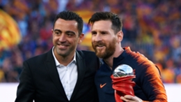 Xavi (L) says Barcelona will discuss the possibility of re-signing Lionel Messi (R) at the end of the season