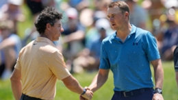 Rory McIlroy (left) and Jordan Spieth shake hands after the second round of the Memorial Tournament (Darron Cummings/AP)