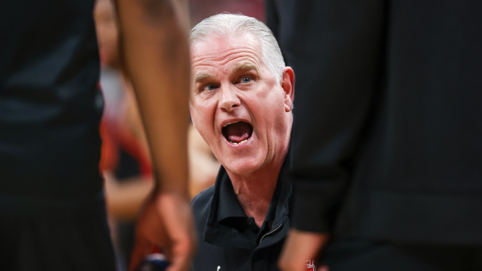 Aztecs coach Brian Dutcher addresses his players