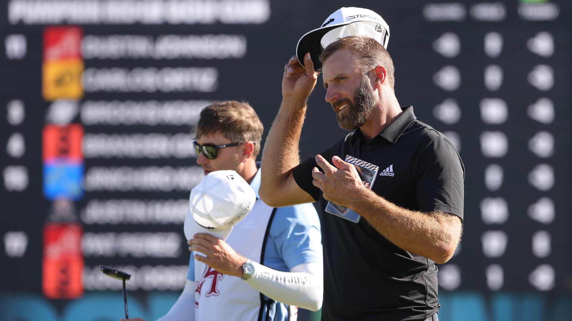 Dustin Johnson with his brother and caddie Austin Johnson at LIV Golf Portland