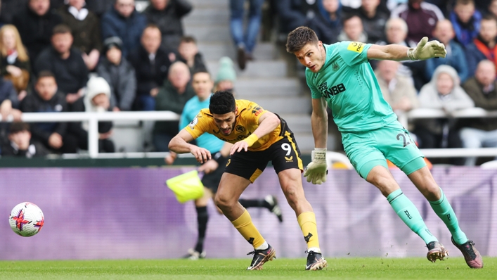 Wolves wanted a penalty after this collision between Raul Jimenez (L) and Nick Pope (R)