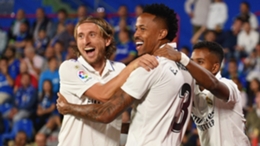 Eder Militao (centre) celebrates with Real Madrid team-mate Luka Modric