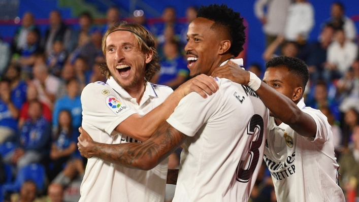 Eder Militao (centre) celebrates with Real Madrid team-mate Luka Modric