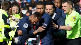 Neymar attempts to walk from the field against Lille before having to be carried off